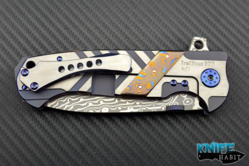 custom Andre De Villiers Ronin knife, mokuti frame inlay and backspacer, damascus blade steel, blue anodized hardware