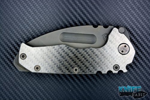 semi-custom greg medford knife & tool limited edition stealth mid-tech knife, carbon fiber show side, black pvd d2 blade, titanium lockside, hardware, clip