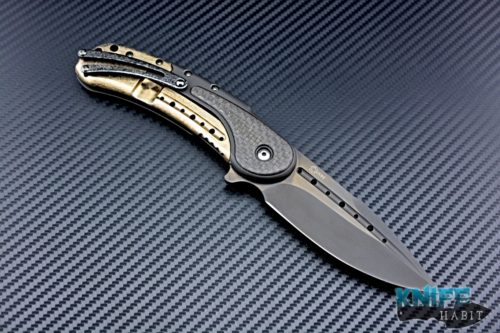 semi-custom todd begg bodega mid-tech knife, black & gold titanium, light strike carbon fiber inlays, bohler n690 blade fluting, cracked ice