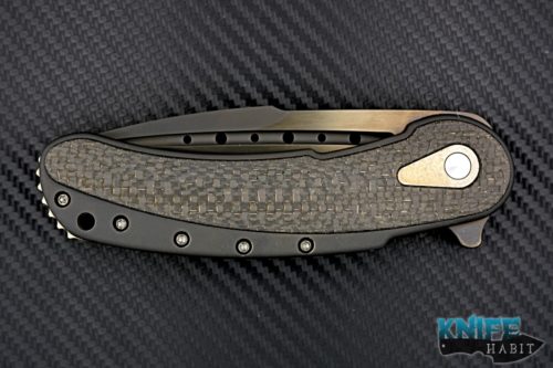 semi-custom todd begg bodega mid-tech knife, black & gold titanium, light strike carbon fiber inlays, bohler n690 blade fluting, cracked ice