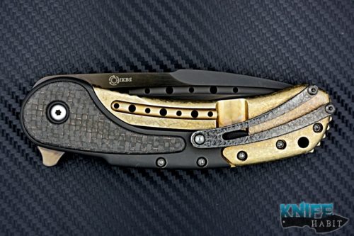 semi-custom todd begg bodega mid-tech knife, black & gold titanium, light strike carbon fiber inlays, bohler n690 blade fluting, cracked ice