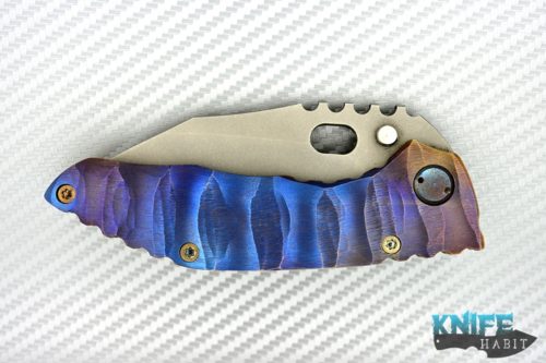 custom dalibor bergam draco knife, deep sculpted titanium frame colorfully anodized, acid washed 3v blade steel