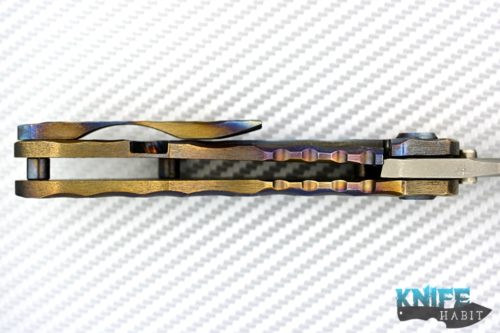 custom dalibor bergam draco knife, deep sculpted titanium frame colorfully anodized, acid washed 3v blade steel