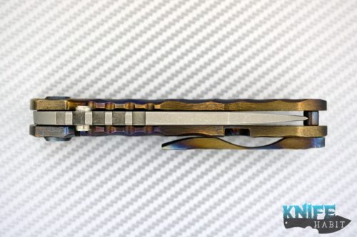 custom dalibor bergam draco knife, deep sculpted titanium frame colorfully anodized, acid washed 3v blade steel