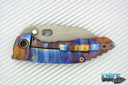 custom dalibor bergam draco knife, deep sculpted titanium frame colorfully anodized, acid washed 3v blade steel