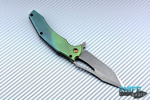 custom gavko spinner knife, thicker model, circle milling, anodized fade blue to green, acid washed aeb-l blade with polished tip