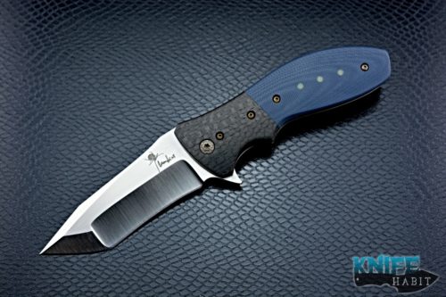 custom kirby lambert snap mgt flipper knife, light strike carbon fiber bolsters, blue g10 scales with moon glow inlays, cts-xhp blade steel, satin finish, recurve compound grind