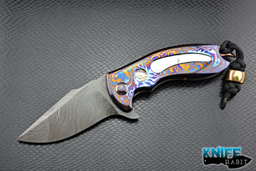 custom alistair bastian praymantis knife, mosaic damascus blade steel, white pearl inlays, shell inlays, titanium frame