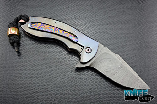 custom alistair bastian praymantis knife, mosaic damascus blade steel, white pearl inlays, shell inlays, titanium frame