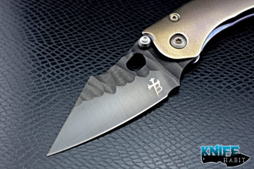 custom borka blades stitch, black dlc coated m390 blade steel, top blade beveled, purple and gold anodized titanium handle