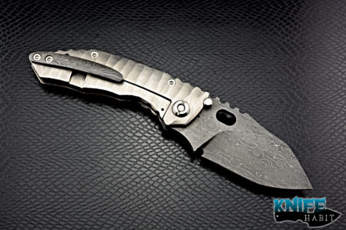 custom dalibor bergam draco knife, fireball damascus blade and clip, sculpted titanium handle