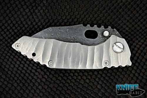 custom dalibor bergam draco knife, fireball damascus blade and clip, sculpted titanium handle