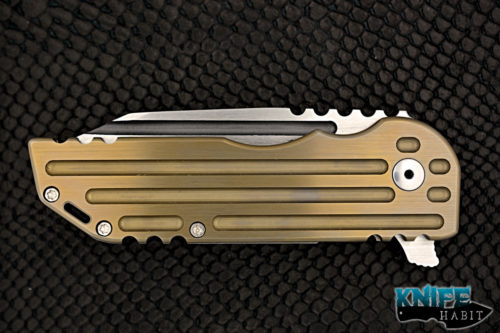 custom alphahunter tactical design color series warhorse, gold anodized milled titanium frame, satin 3v blade steel