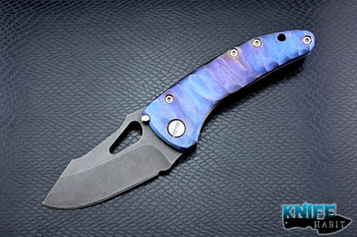 custom damjan eror small saurus knife, blue purple anodized sculpted titanium handle, aside washed 3v blade steel