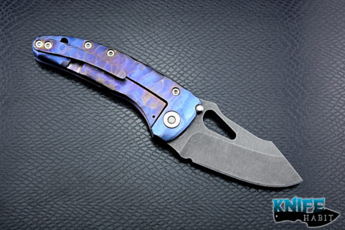 custom damjan eror small saurus knife, blue purple anodized sculpted titanium handle, aside washed 3v blade steel