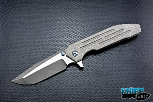 custom peter rassenti snafu integral knife, dual tone triple grind blade, desert floor titanium milled handle, blue hardware