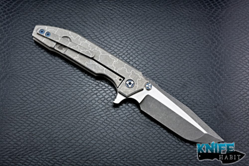 custom peter rassenti snafu integral knife, dual tone triple grind blade, desert floor titanium milled handle, blue hardware