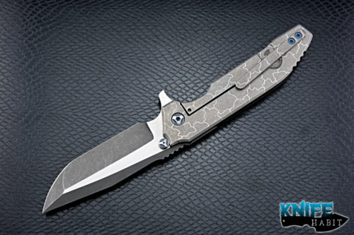 custom peter rassenti snafu integral knife, dual tone triple grind blade, desert floor titanium milled handle, blue hardware