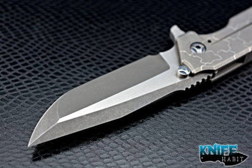 custom peter rassenti snafu integral knife, dual tone triple grind blade, desert floor titanium milled handle, blue hardware