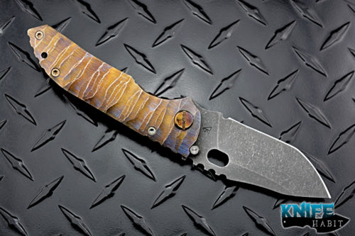 custom dalibor bergam sirius knife, sculpted blue and gold anodized titanium frame, acid washed 3v blade steel