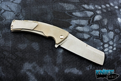 custom TK knives juggernaut knife, stonewashed titanium frame, blue anodized scultped backspacer