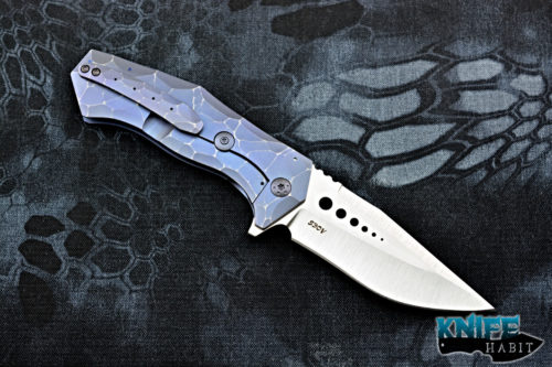 custom randy doucette crossbones knife, thick s30v blade steel, blue sculpted titanium frame-lock