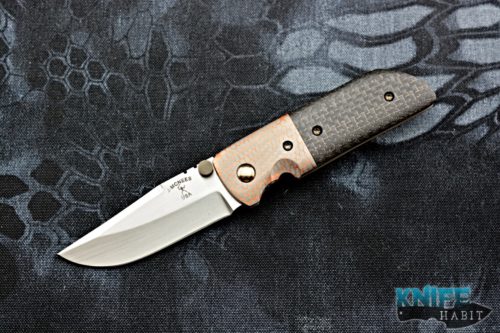 custom jonathan mcnees tanjun knife, copper super conductor, light strike carbon fiber, cpm 154 blade steel, bronzed titanium