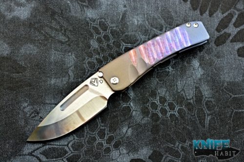 custom greg medford midi marauder knife, vulcan d2 blade steel, bronze purple blue sculpted titanium handle