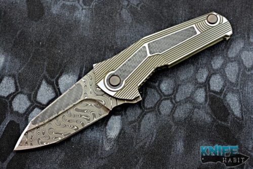 custom mikkel willumsen sugga knife, blurple anodized titanium frame, carbon fiber inlays, damascus blade steel